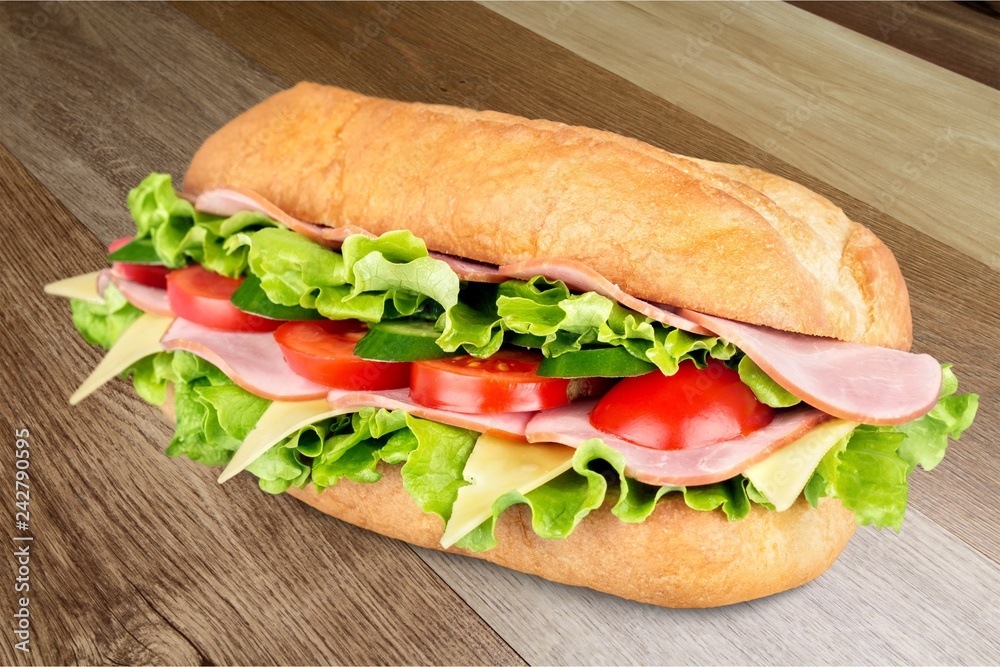 Ham and cheese salad submarine sandwich from freshly cut Ham and cheese salad submarine sandwich from freshly cut