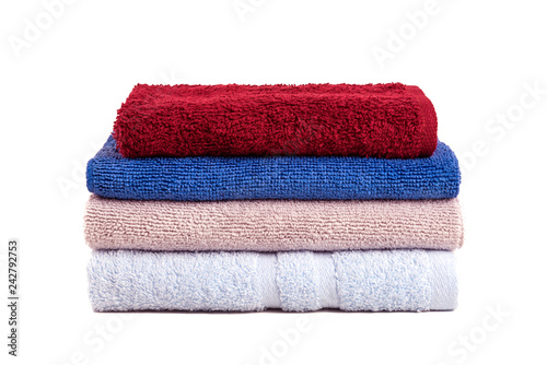 stack of colorful towels isolated on white background