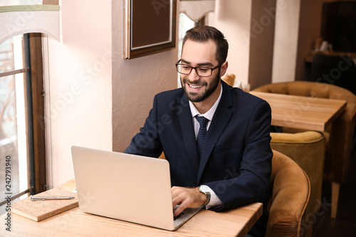 Young businessman working o...