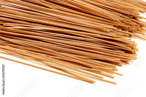Raw soba  dried buckwheat noodles  on a white background