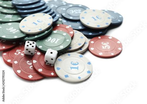Chips and dices for gambling games in casino on white background