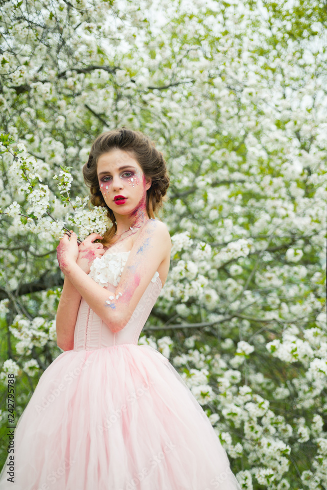 Spring beauty. face and skincare. womens health. allergy to flowers. Summer girl at blooming tree. Springtime. weather forecast. Natural beauty and spa therapy. Woman with spring fashion makeup Spring beauty. face and skincare. womens health. allergy to flowers. Summer girl at blooming tree. Springtime. weather forecast. Natural beauty and spa therapy. Woman with spring fashion makeup