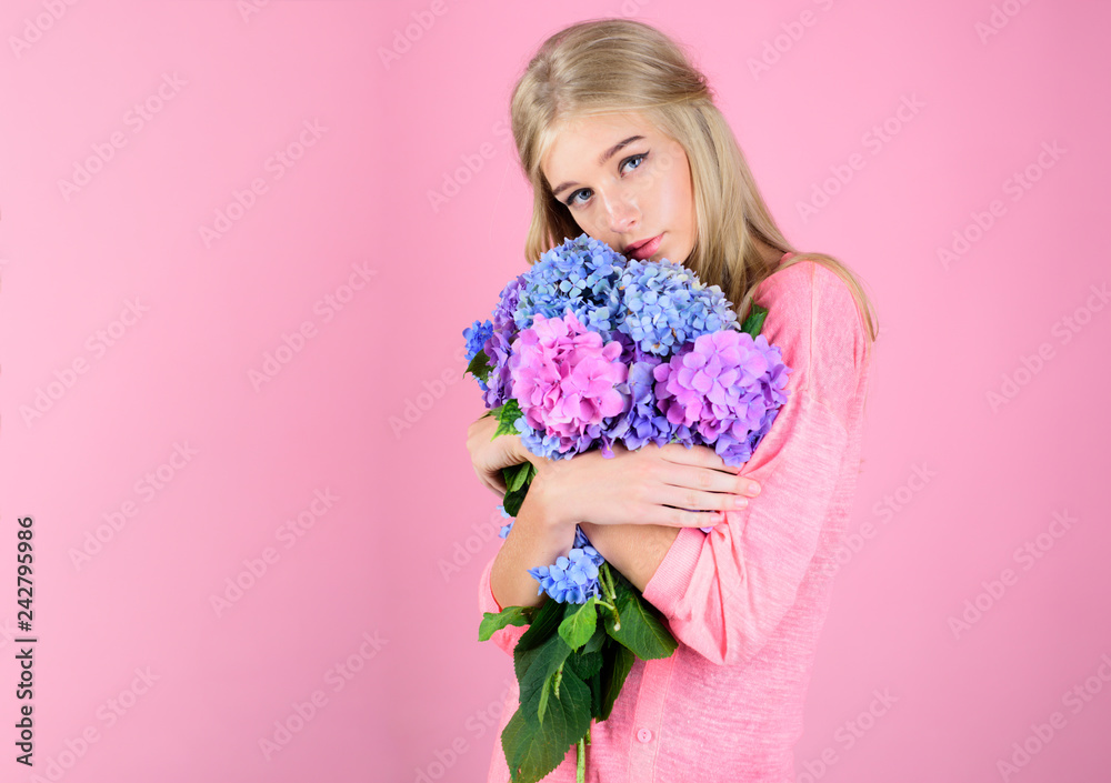 Makeup cosmetics and skincare. Summer beauty. girl with summer makeup. Spring woman with hydrangea flowers. Fashion portrait of woman. Healthy hair and skin. Spring freshness