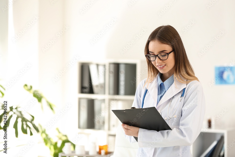 Portrait of beautiful female doctor in clinic Portrait of beautiful female doctor in clinic