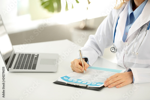 Medical professional writin...