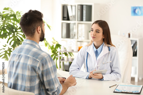 Female doctor working with ...