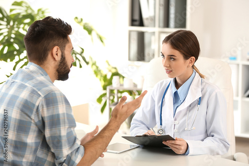 Female doctor working with ...