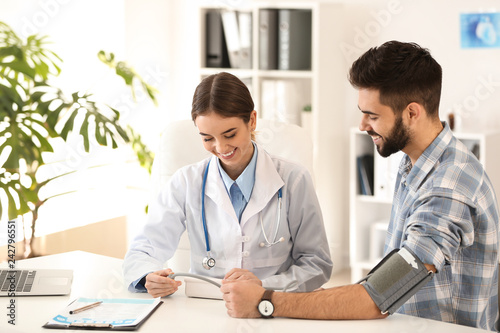 Female doctor working with ...