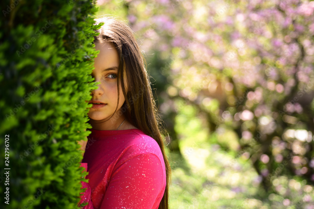 Enhancing the skins beauty. Beauty model with fresh look. Young lady in spring garden. Cute girl on spring nature. Pretty girl with young face skin and no makeup. Skincare and natural skin cosmetics Enhancing the skins beauty. Beauty model with fresh look. Young lady in spring garden. Cute girl on spring nature. Pretty girl with young face skin and no makeup. Skincare and natural skin cosmetics