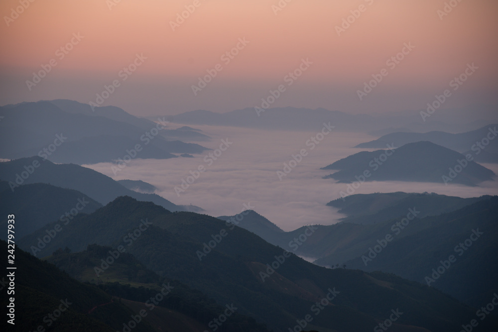 Mountain valley during sunrise. Natural summer landscape