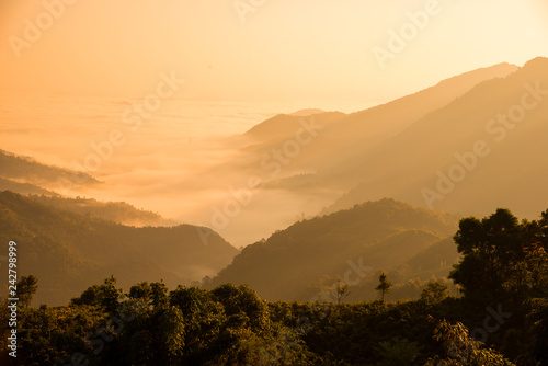 Sunrise over the mountain landscape, A beautiful sun rays with clouds 