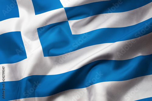 Fotografie Satin texture of curved flag of Greece
