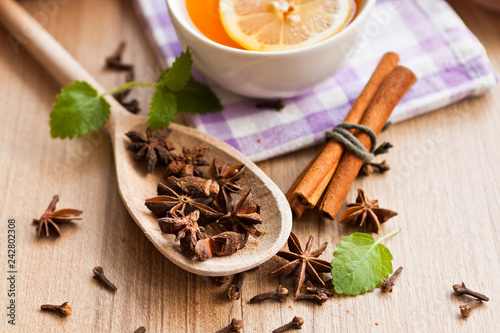 Hot drink (apple tea, punch) with cinnamon stick, star anise and clove.