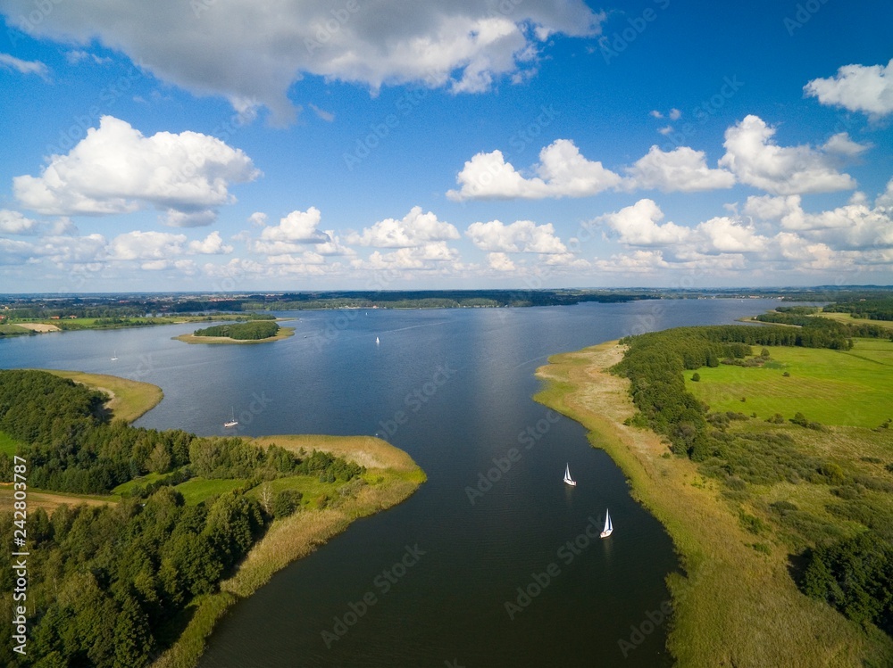 Aerial view of yachts sailing on Swiecajty Lake, Kal village (former Kehlen or Kielno, East Prussia), Mazury, Poland