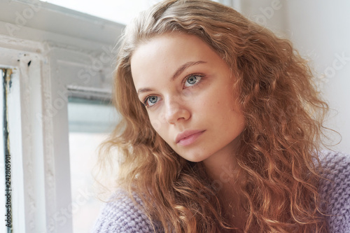 portrait of a beautiful young girl. pensive face close. melancholy teenager