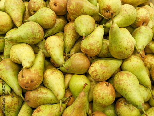 Ripe pears on the storefront in the store