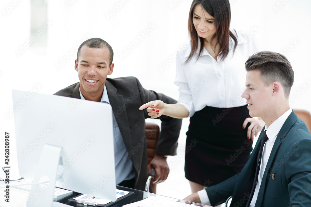business team analyzing operational information ,sitting at their Desk business team analyzing operational information ,sitting at their Desk