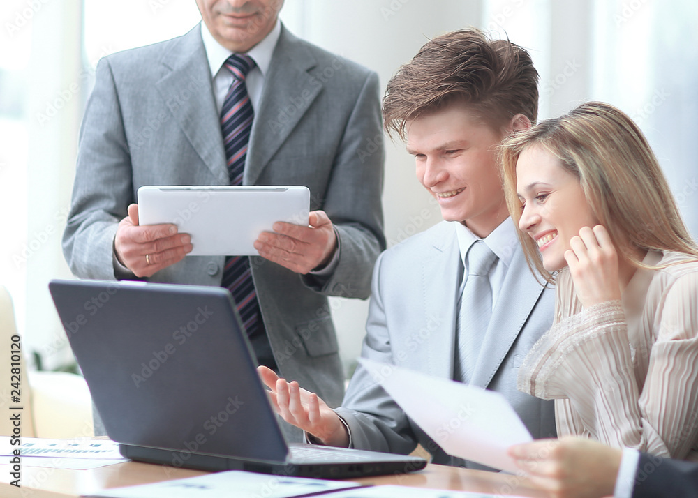 close up.businessman and business team analyzing financial data. photo with copy space close up.businessman and business team analyzing financial data. photo with copy space