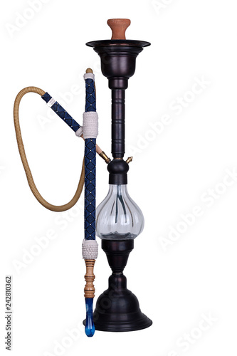 Hookah is a glass with silver body similar to a luminaire and a bunch of blue flowers.