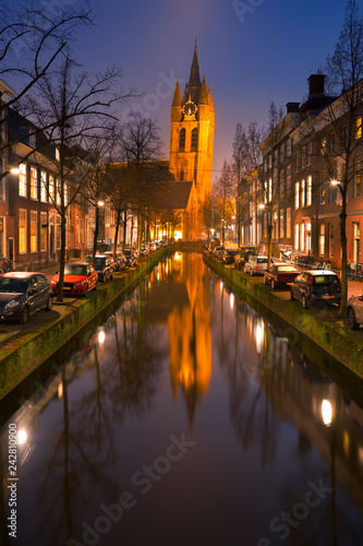 Church reflected in a canal in Delft, The Netherlands © sara_winter
