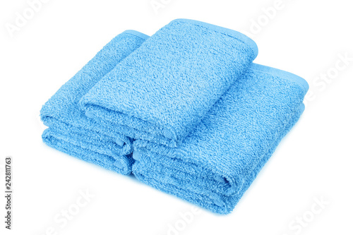 Clean blue towels, isolated on white background