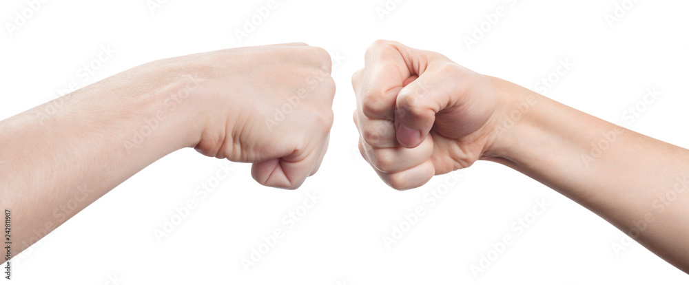Two fists hitting each other, isolated on white background Two fists hitting each other, isolated on white background