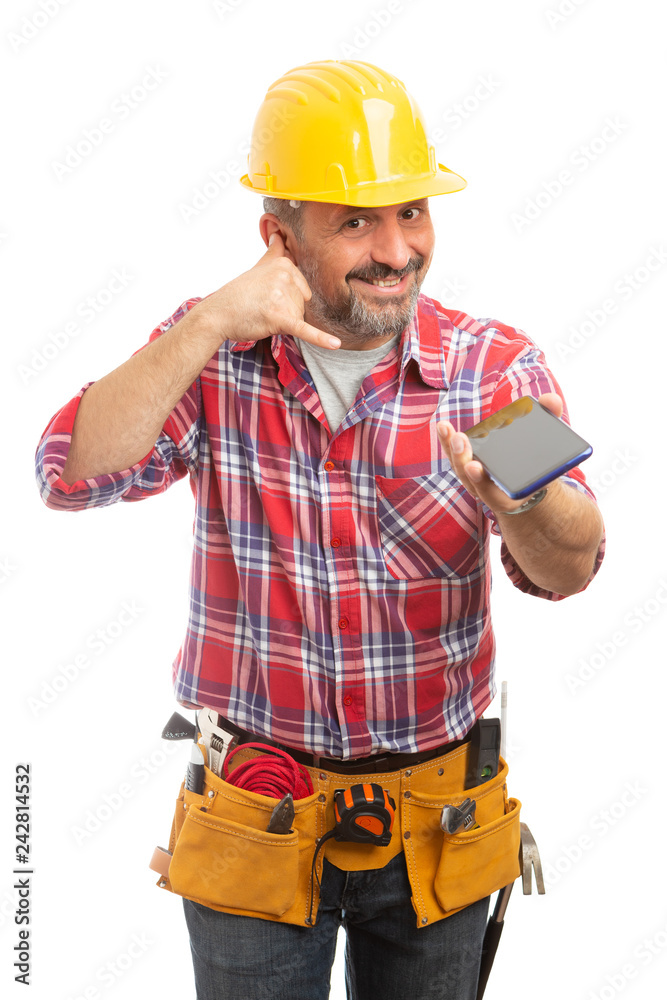 Construction worker making call us gesture.