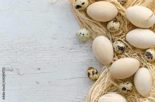 Easter eggs on wooden background. Happy easter mockup top view