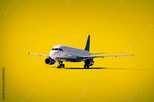 Commercial air plane on a yellow background .