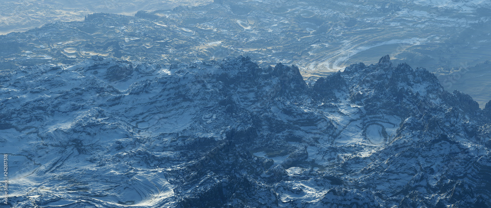 Aerial of rough bare mountains with snow at sunrise.