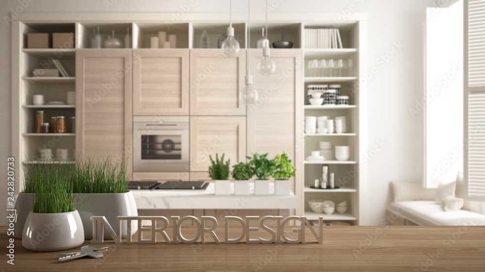 Wooden table, desk or shelf with potted grass plant, house keys and 3D letters making the words interior design, over modern white kitchen, project concept background Wooden table, desk or shelf with potted grass plant, house keys and 3D letters making the words interior design, over modern white kitchen, project concept background