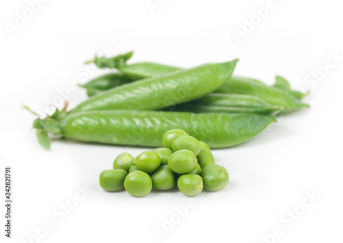 green peas in pods on a white background