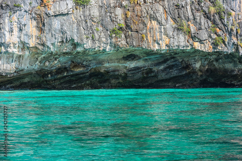 natural famous Phi phi island with reflection light from blue sea water.