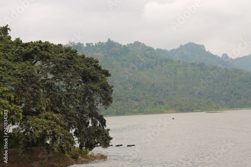 selorejo lake in mountains of Indonesia photo