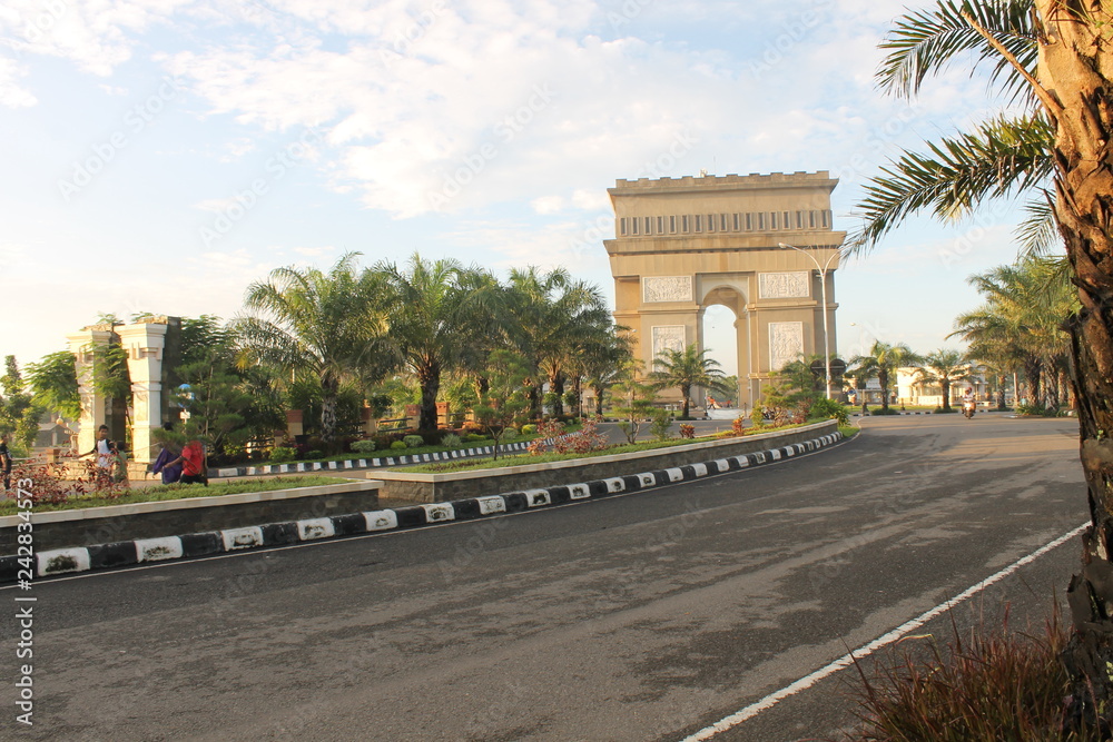 gumul building with palm tree at morning in Kediri, Indonesia