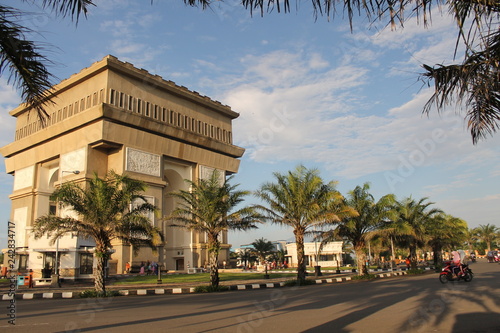 gumul building with palm tree at morning in Kediri, Indonesia photo