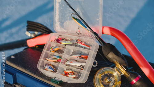 Winter fishing tackle. Fishing on the ice. photo