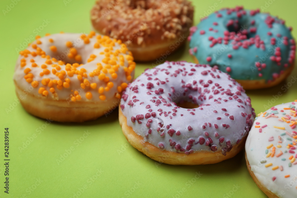 Sweet tasty donuts on color background Sweet tasty donuts on color background