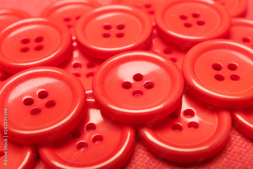 Heap of coral buttons, closeup Heap of coral buttons, closeup
