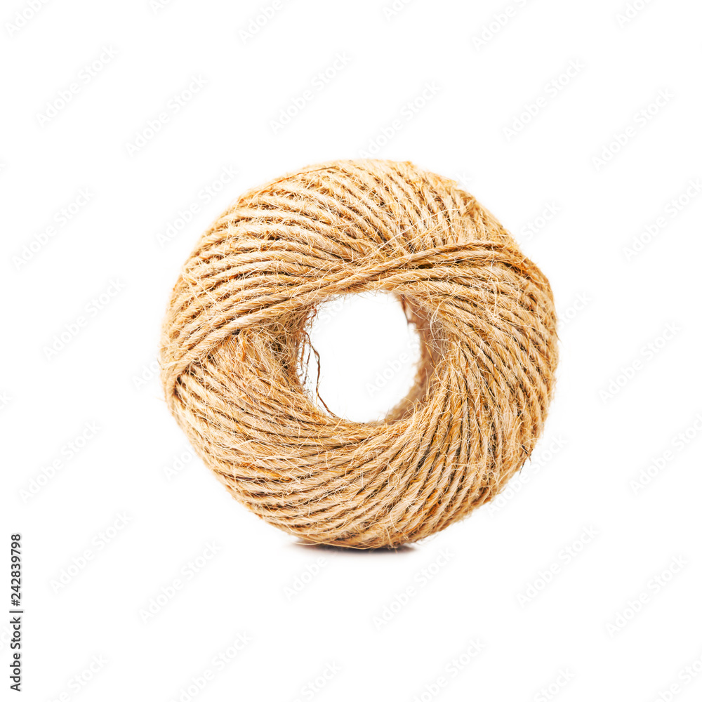 Obraz premium Hemp rope roll isolated on white.