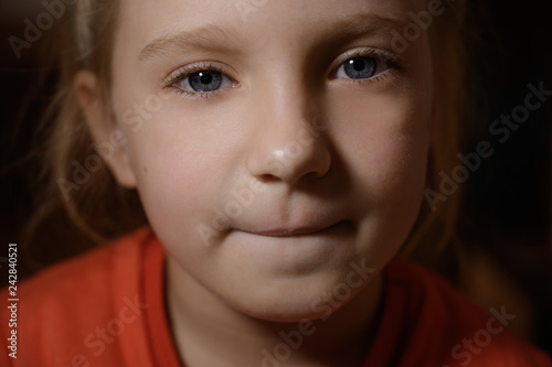 Close-up portrait of adorable little girl. Selective focus with shallow depth of field.