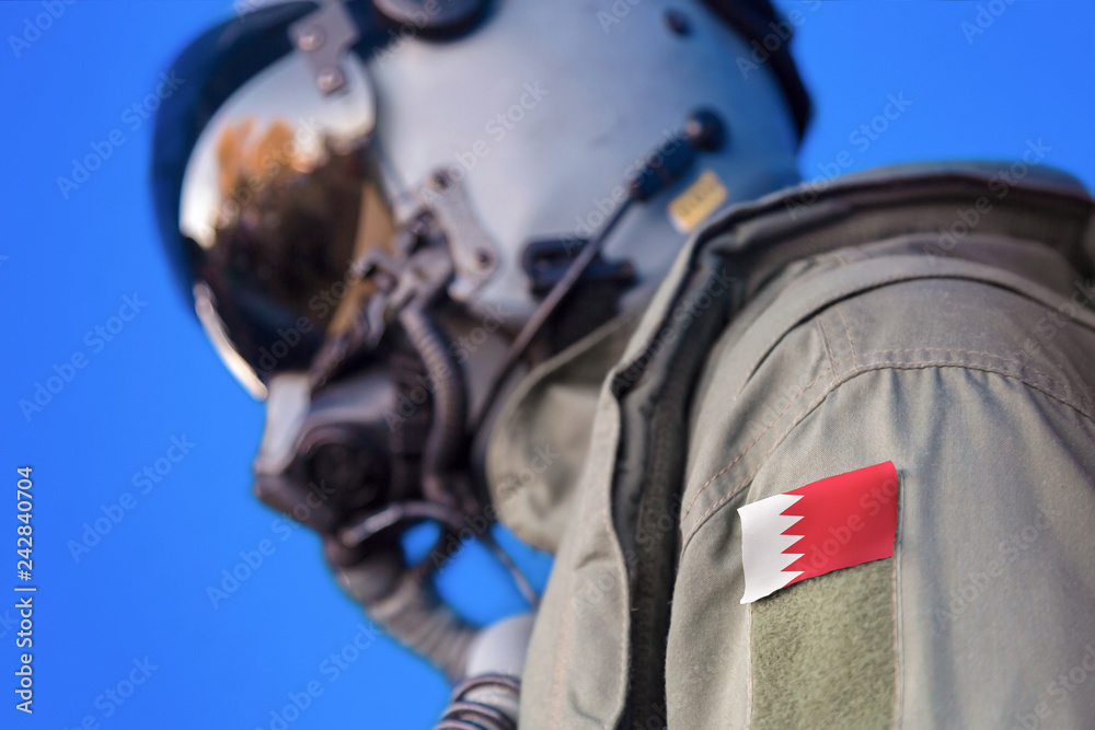 Air force pilot flight suit uniform with Bahrain flag patch. Military jet aircraft pilot
