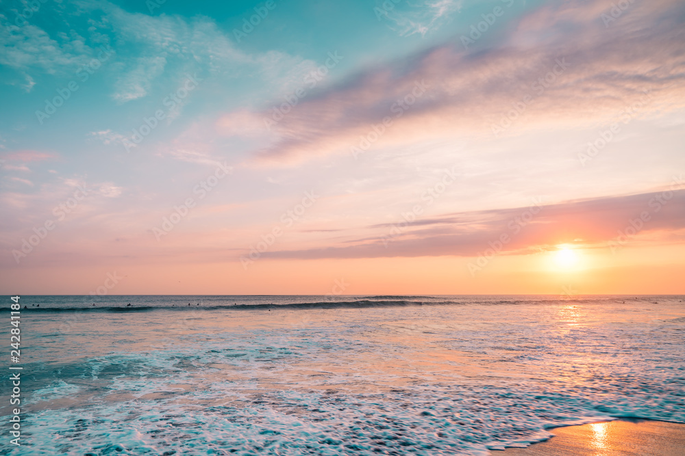 Pink Sunset Sea with Surfers. Colorful Landscape of Paradise Tropical  Island Beach, Sunrise Surfing Shot. Blue & Pink Barrel Wave in Ocean. Clear  Surfers Wave and Sun Light. Ocean Water Background. Stock