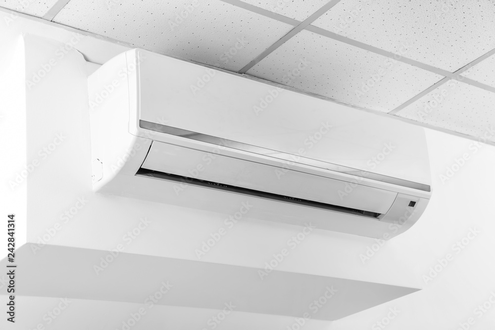Modern air conditioner on wall Modern air conditioner on wall