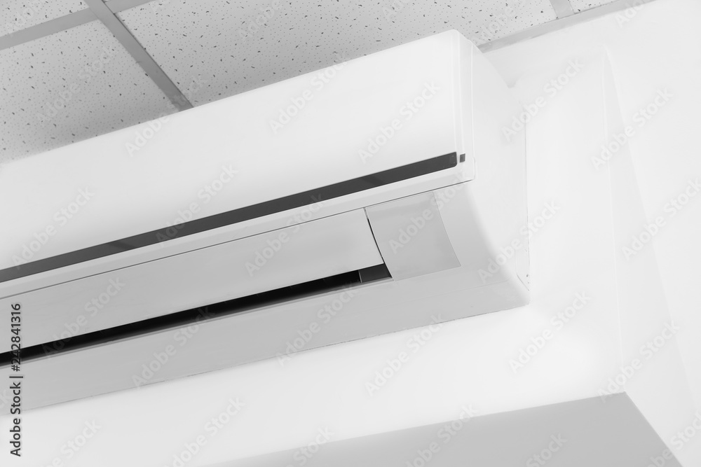 Modern air conditioner on wall