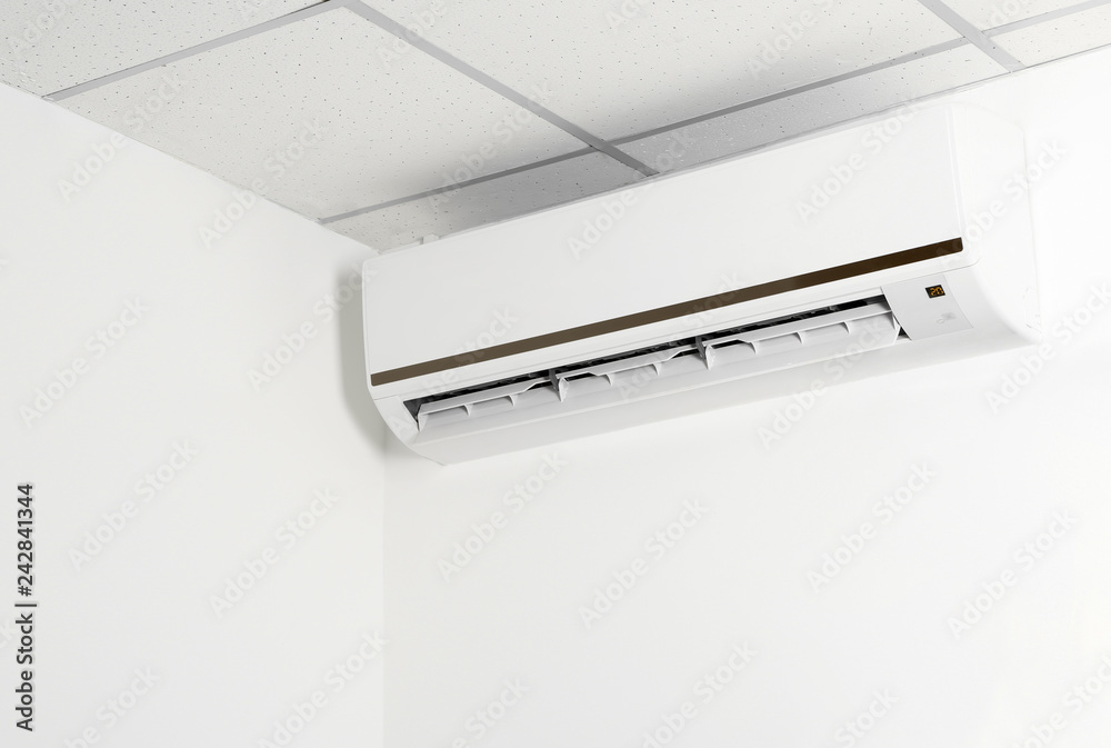 Modern air conditioner on wall Modern air conditioner on wall