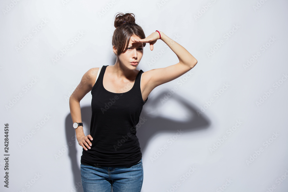 people, style and fashion concept - happy young woman or teen girl in casual clothes having fun. people, style and fashion concept - happy young woman or teen girl in casual clothes having fun.