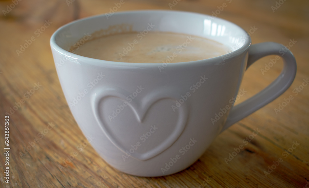 Fototapeta premium Coffee cup with heart shape