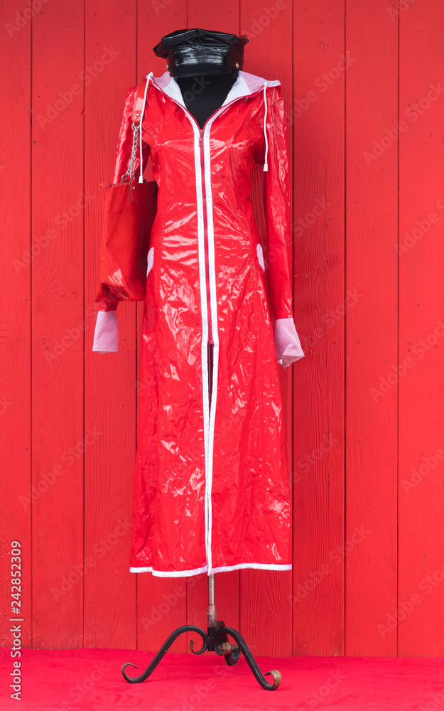 red fashion coat on mannequin