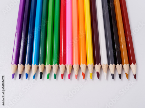colored pencils sharpened on a white background.